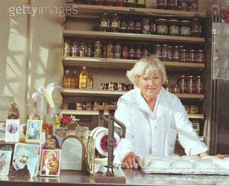 Elderly-Woman-Behind-the-Counter-in-a-Small-Town.jpg